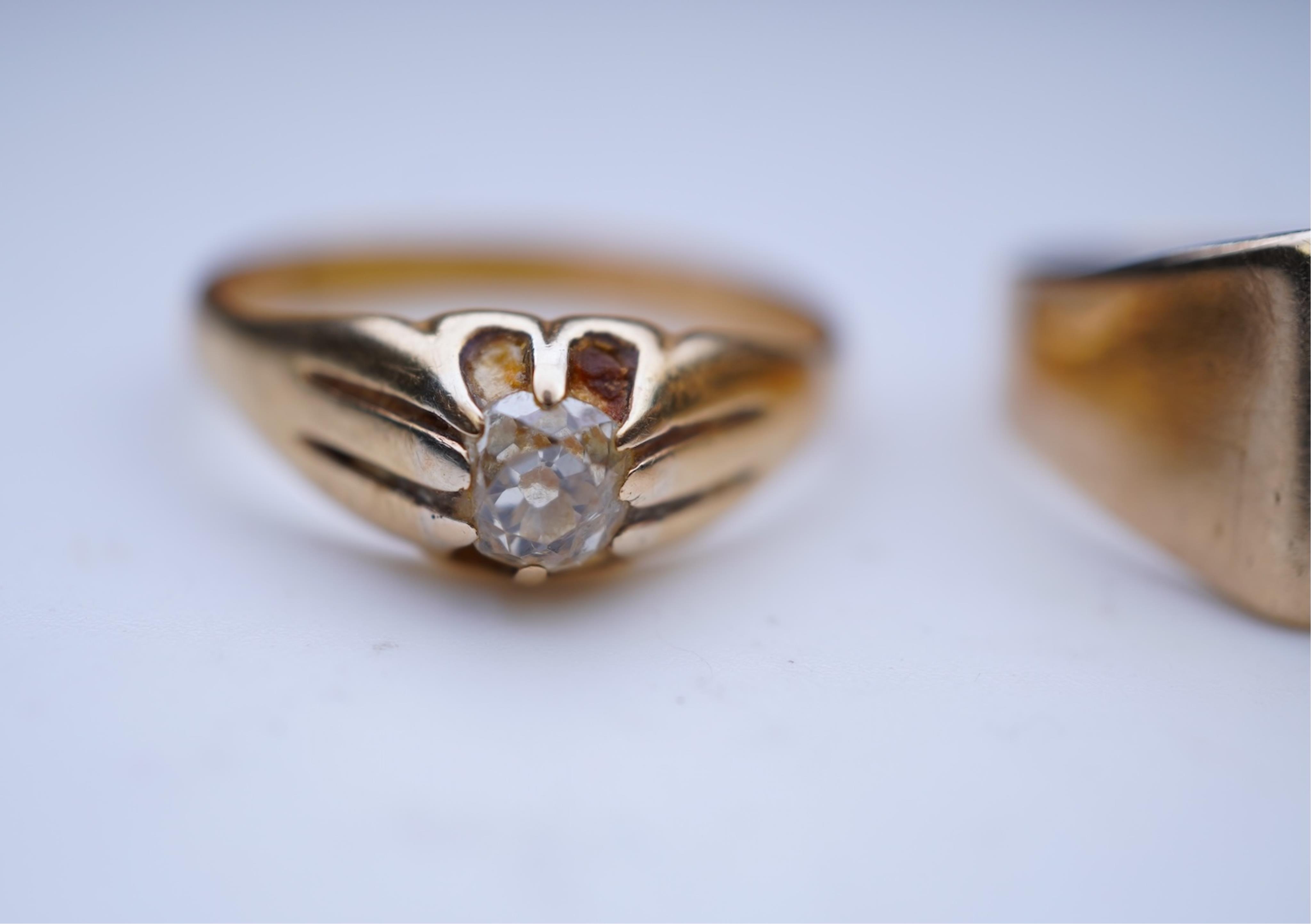 Two gold and diamond rings